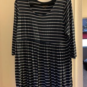 Mid length navy striped dress.